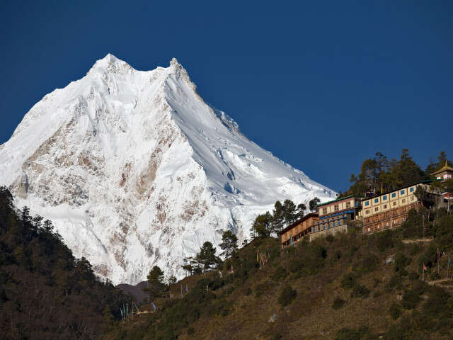 Buddhist Monastery In Front Of Manaslu Peak